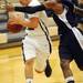 Greenhills junior Andrew Khouri moves the ball around Eastern Washtenaw Multicultural sophomore Kornelius Saxton during the second half at Greenhills on Thursday. Melanie Maxwell I AnnArbor.com